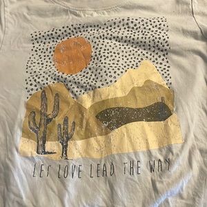 brand PINK quote on bottom “let love lead the way.”